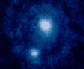 Pluto (oben) mit Charon (unten)